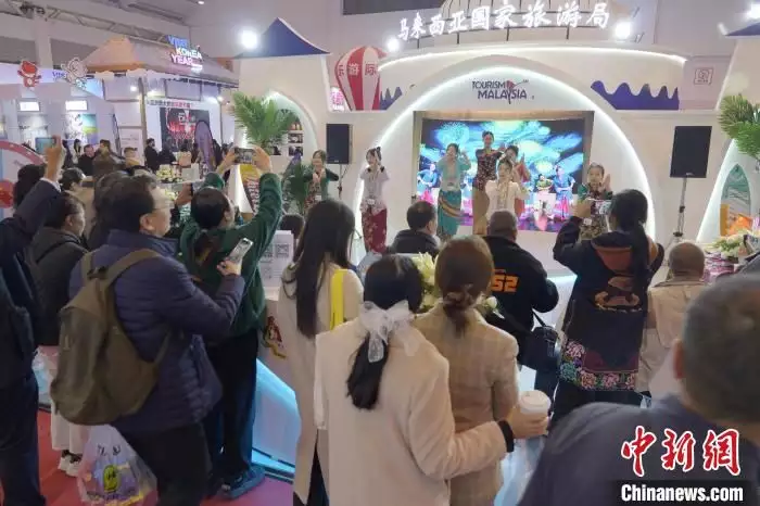 马来西亚馆亮相旅交会 “马来文化之旅”吸引市民围观
