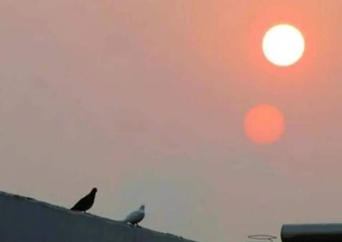 波斯湾太阳与月亮诡异同框,“恶魔之角”现身,景象如同修罗地狱