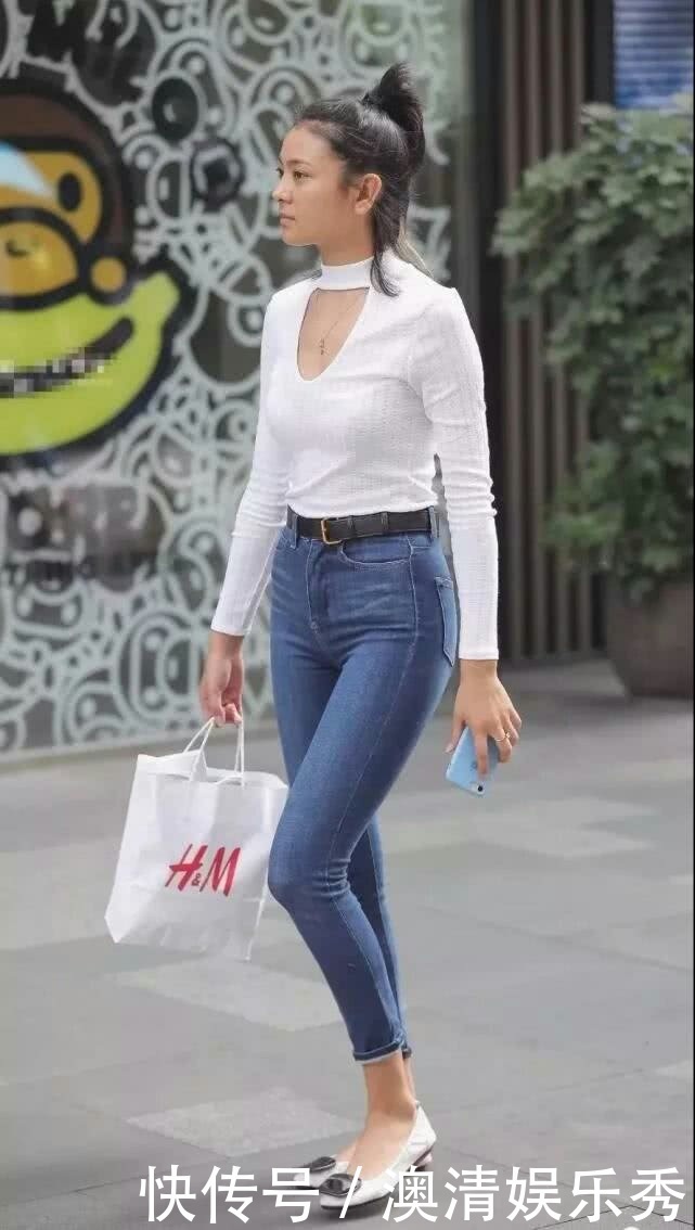 牛仔裤美女拥有含蓄的浪漫情怀,左看右看都美丽极了