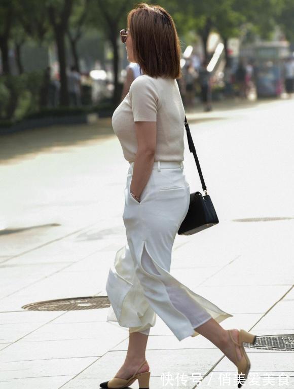 短袖|穿衣追求潇洒的美,米色短袖衫配白色甩甩裤,穿搭清爽又时髦
