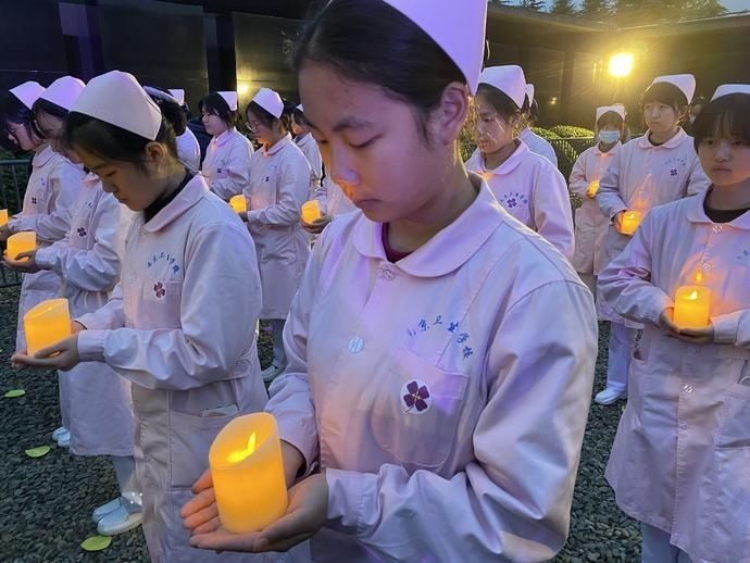  撒向|南京举行“烛光祭”：愿和平的种子撒向世界每一个角落