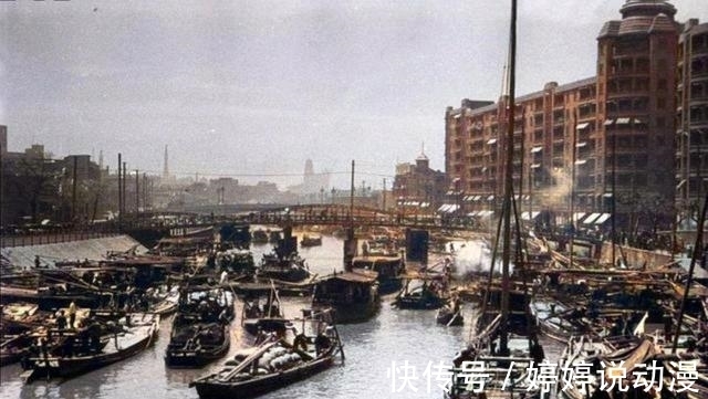 上海|上海1934年老照片，繁忙的苏州河，修建中的百老汇大厦