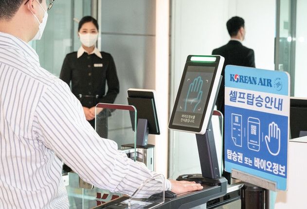 自助登机|韩国机场实现“刷手”自助登机 无需机票