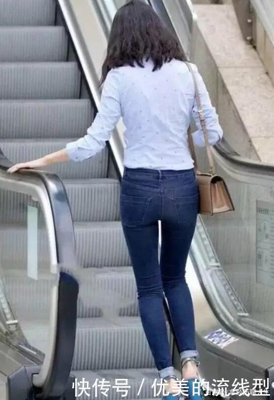 紧身牛仔裤,对身材具有很好的修饰作用,打造出曼妙身姿