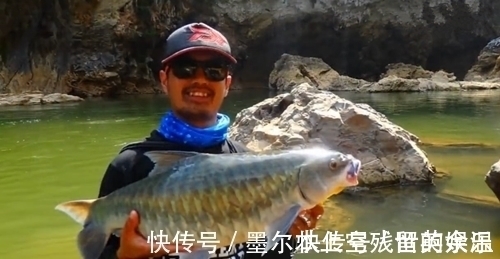 和朋友深山钓鱼,意外钓上“奇鱼”,鱼鳞大,颜色也特别,什么鱼