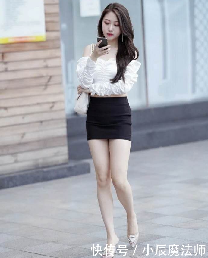 气质型美女，搭配黑色包臀裙，魅力强大