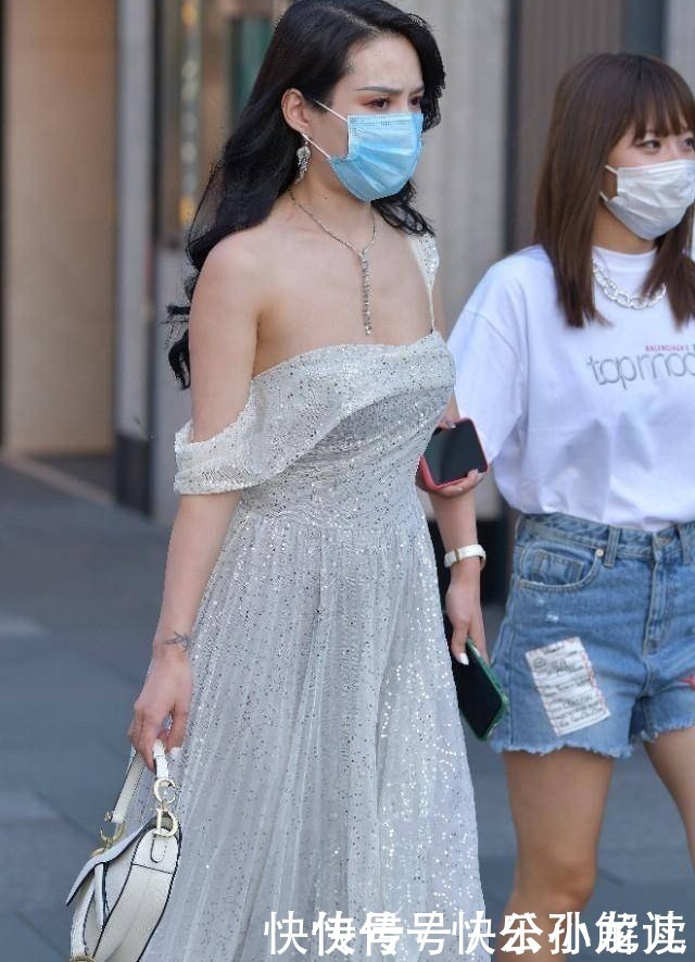 气质优雅的小姐姐，时尚穿搭单肩吊带裙，尽显迷人的身段