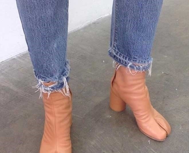 gai 令人瞠目的怪鞋子:仿效骆驼趾,把金鱼缸穿在脚下