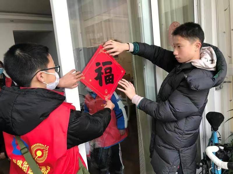 卓锦城|迎新春送温暖 社区网格化志愿服务暖人心