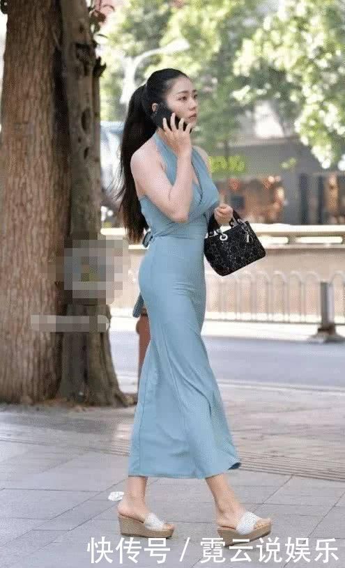 来说|街拍美女谁说有肉感的女生不能轻松驾驭吊带裙的