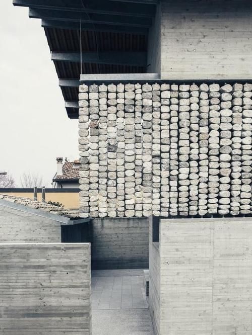 外墙|一根钢筋,串上一块块石子做外墙,多用个10年完全没有问题