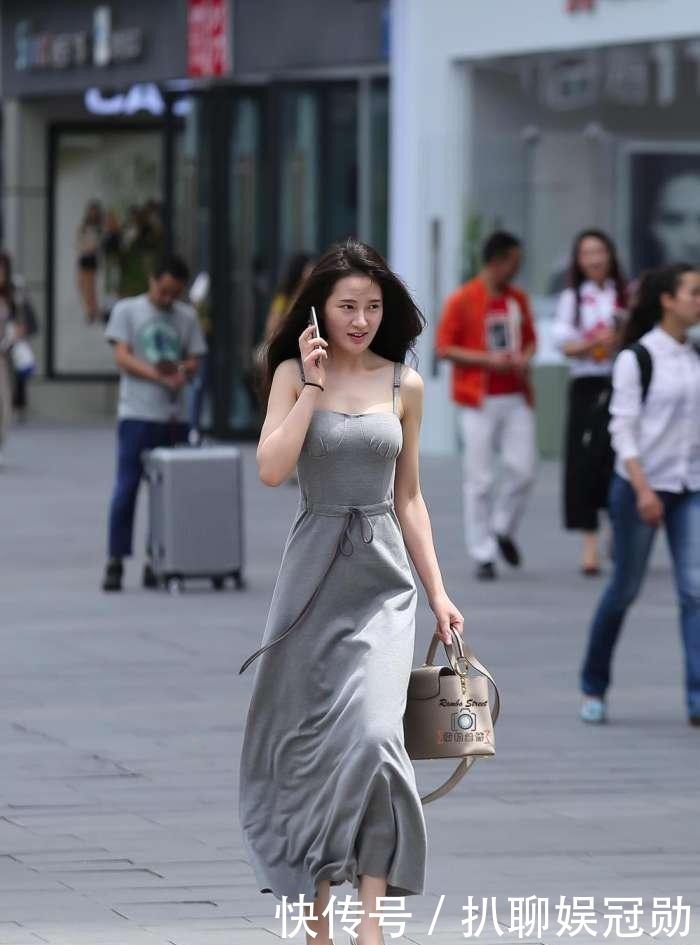 干练|少妇一袭长裙,眼神犀利,尽显干练利落