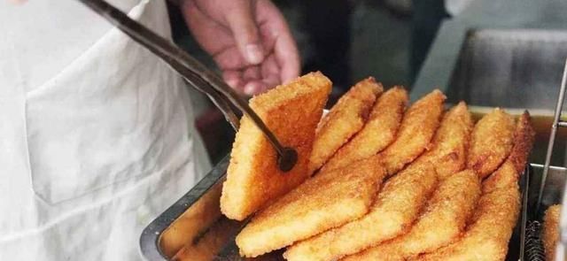 金黄|米饭被压榨和油炸金黄的年糕在口中留香