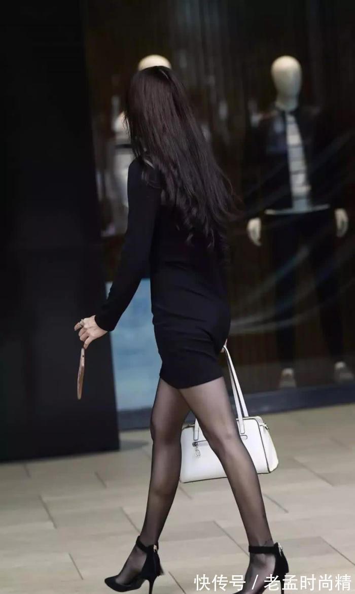 丰满|街拍:一身黑色打扮身材丰满的性感美妇,气质成熟,让人心生爱恋