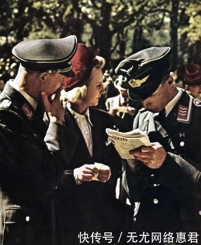 德军士兵|1941年德军占领下的巴黎：美女盛装逛街，德军看报纸也得花钱