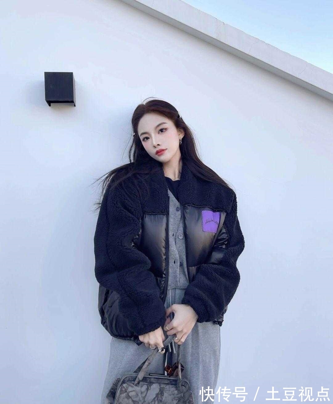 衣身 黑色羽绒服也能穿出高级感?看看这些搭配方式,简约日常又保暖