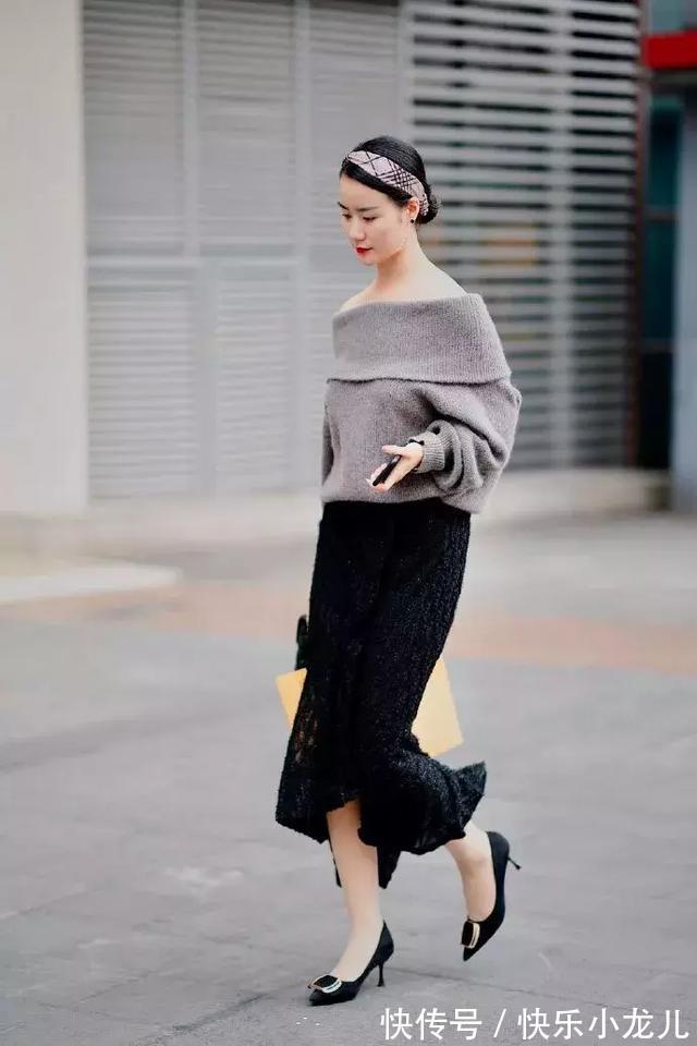 休闲西装 黑色开衫,优雅白色包臀裙,短款的裙摆让双腿显的十分优雅