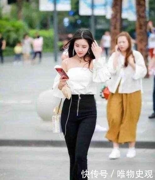 白皙|街拍:白皙时尚迷人的美女,搭配长心,衣服时尚很独特性感!