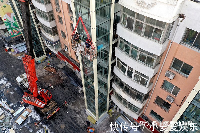 小区|老房子加装电梯有争议“新方案”出现,楼上楼下终于不用吵了