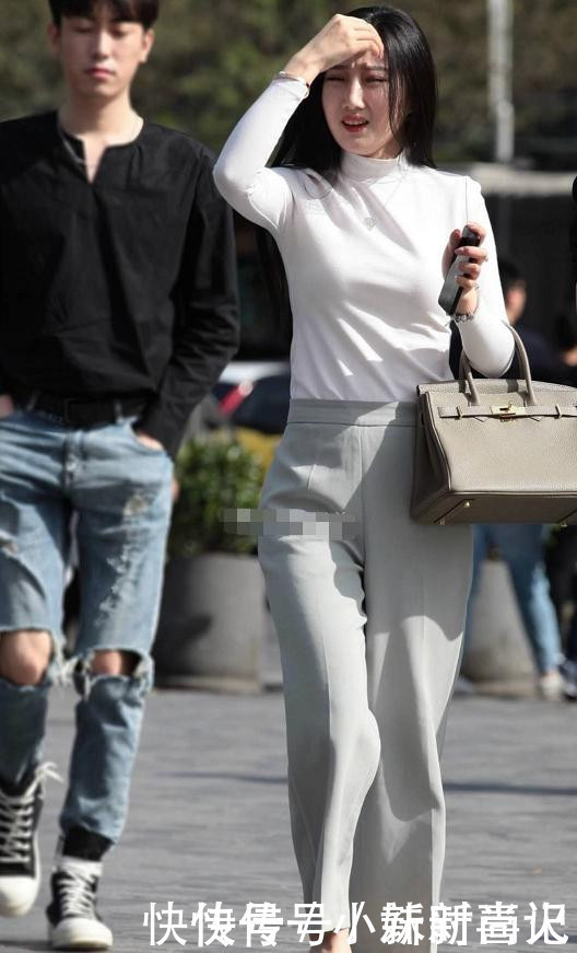 街拍这种正式裤子,不适合女秘书穿,更加适合年轻人选择吧