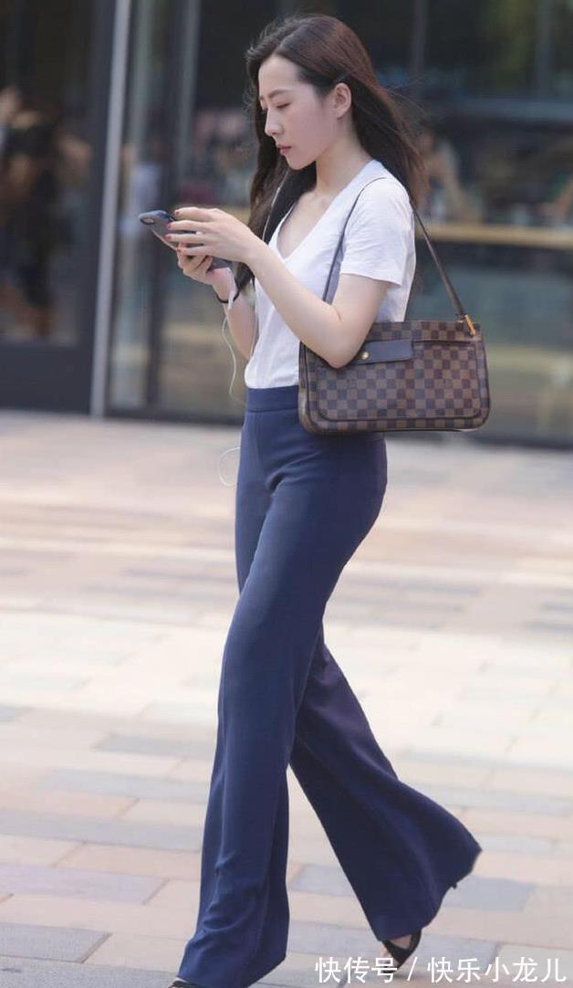 衣橱|非常自信的气质美女，一个人走在街上，散发着独特的味道和气息