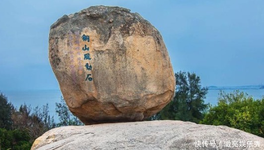 中国一块悬空而立的石头，随着风左右摇晃，却万年屹立不倒