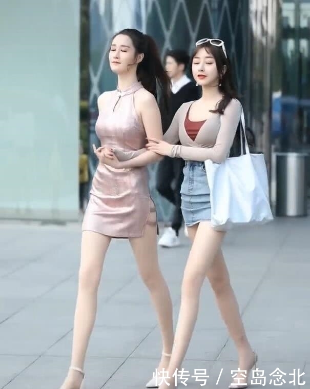 街角的独特风尚,连衣裙VS半身裙哪个更美