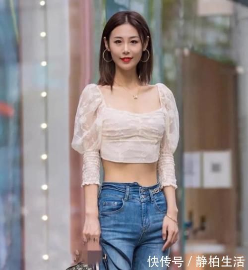 牛仔 美女模特:蓝色牛仔裤展现出漂亮的小蛮腰,美女太可爱了