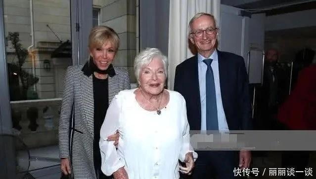 盘发|法国第一夫人整容后又换盘发造型,穿千鸟格套装精致干练,不像66