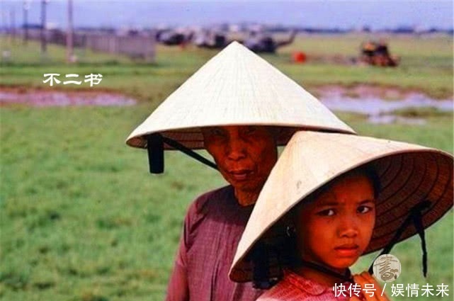 照片拍摄于美越战争|上色老照片:美越战争中的灾难场面,战争之下的人儿眼中满是绝望