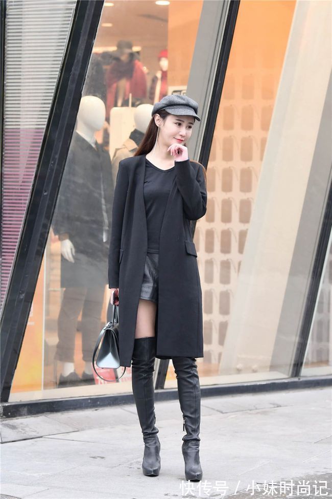 皮裤 黑色细高跟过膝长靴,修身款式,搭配黑色风衣,时尚抢眼