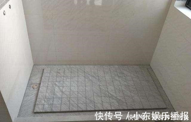 地面|卫生间地面不要再贴瓷砖了,头次见有钱人这样设计,简直太聪明了!
