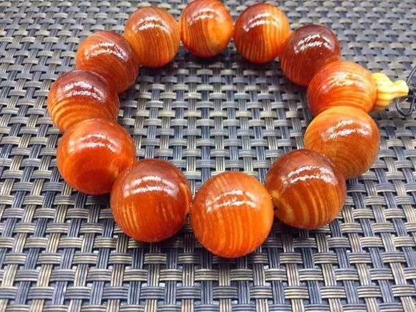 木质文玩|这种木头看上去像蜜蜡,号称“北沉香”,东北人一定见过它