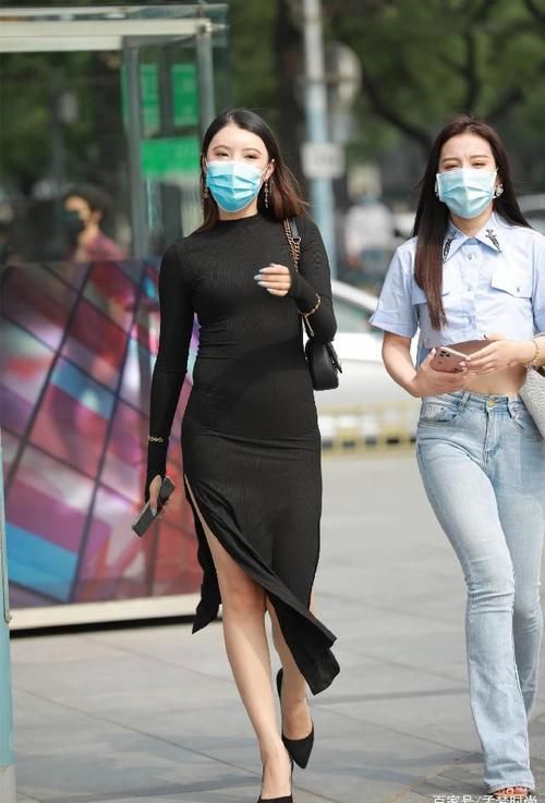 黑色连衣裙搭配高跟鞋，彰显气质女性魅力，展现优美曲线和大长腿