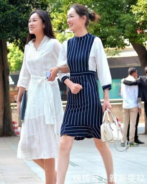 街拍气质高雅的小姐姐,一件吊带背心配开叉裤,时尚女神魅力范