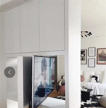 劳累感|不要在客厅装电视机背景墙了,聪明人都这样放电视,时尚又实用