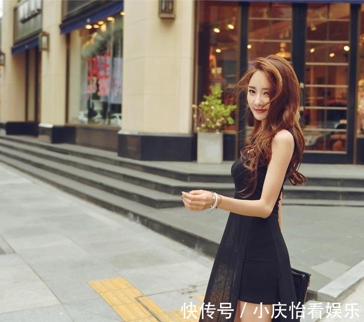 高级感|靓丽美女身穿黑色背心连衣短裙，展示出奢华的高级感