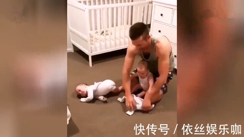 三人份|新晋奶爸为俩娃穿衣火了,被网友纷纷调侃:两只手抓不过来要急死