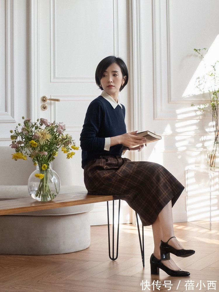 搭配 早春穿裙子流行“过膝不过踝”,配西装、风衣都挺美,打造时髦感