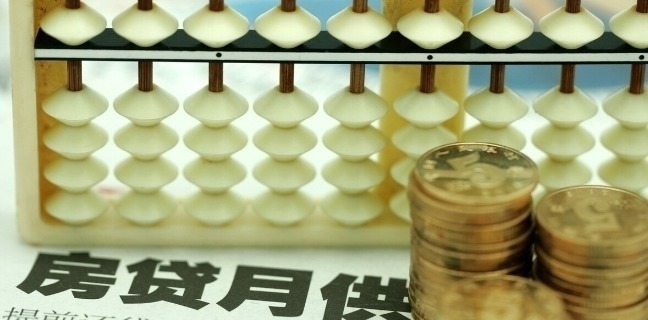 现金|房贷50万,还了三年,现在有40万现金,要不要提前还款