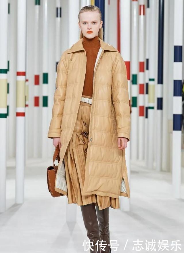 今年流行一种穿法，叫“绗缝棉服+靴子”，保暖不显臃肿，真美