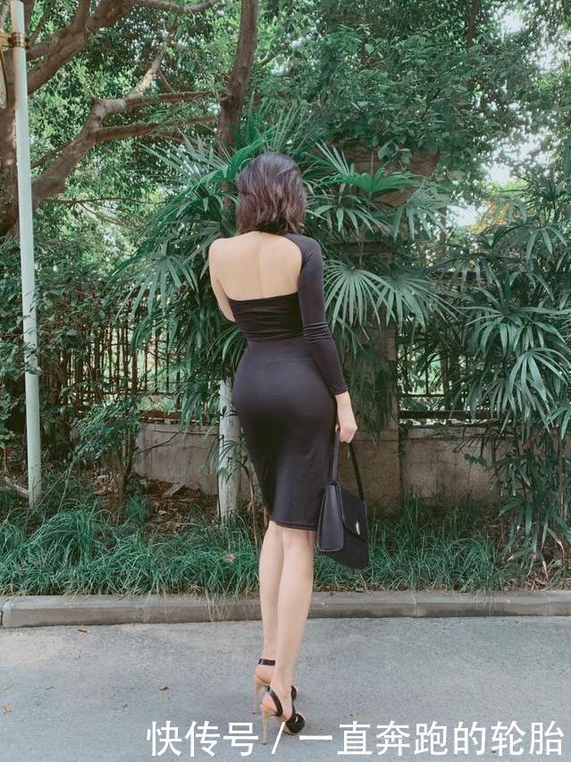  小姐姐穿黑色紧身连衣裙，时尚有个性，设计感十足