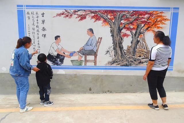 张建军!南华8名画家书法家手绘壁画 助力文明城市创建