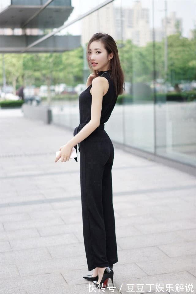 连体裤|街拍:穿着风格很艳丽的小姐姐,身材真的好,墨镜戴起来也格外的吸睛