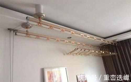 晾衣杆|阳台不要装晾衣杆了,现在都流行装这种代替,方便又实用