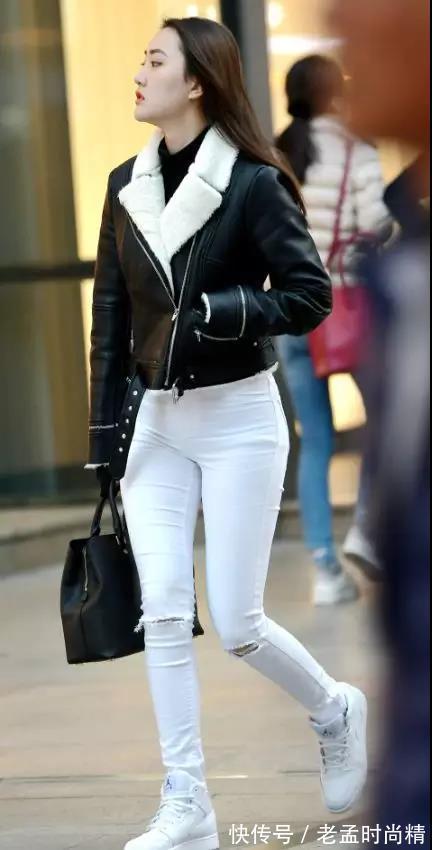 美女 街拍:身上一股动人气韵姿形秀丽相貌娇美的紧身白裤美臀性感美女