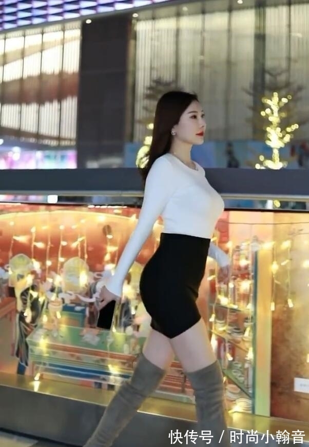 t恤 小黑裙搭上过膝靴，化身冬天潮女，如行走的都市风景