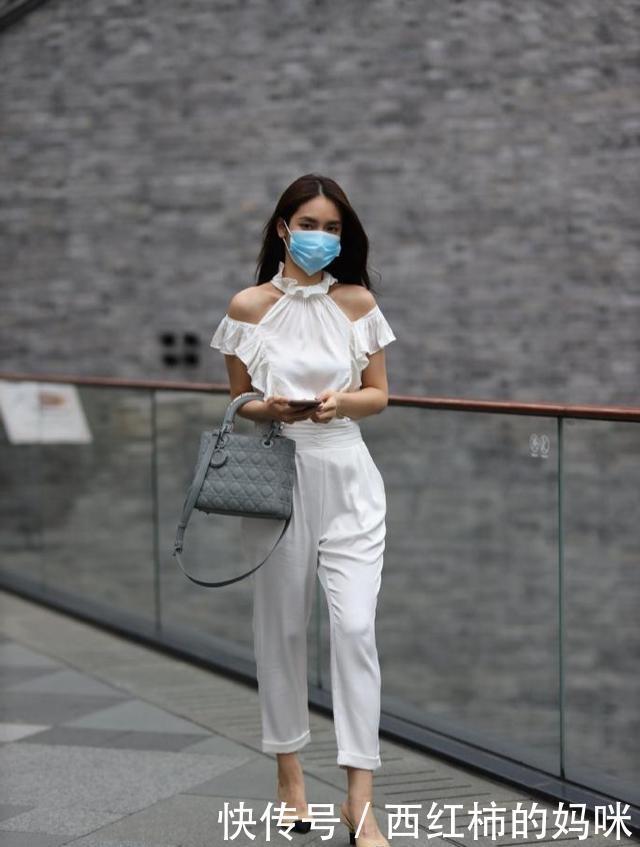 时髦拉风的大衣搭配高跟靴,帅气靓丽