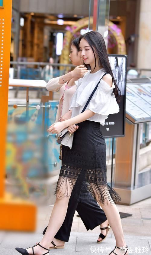 造型 穿流苏裙出行的女生,造型大方得体,又美又气质