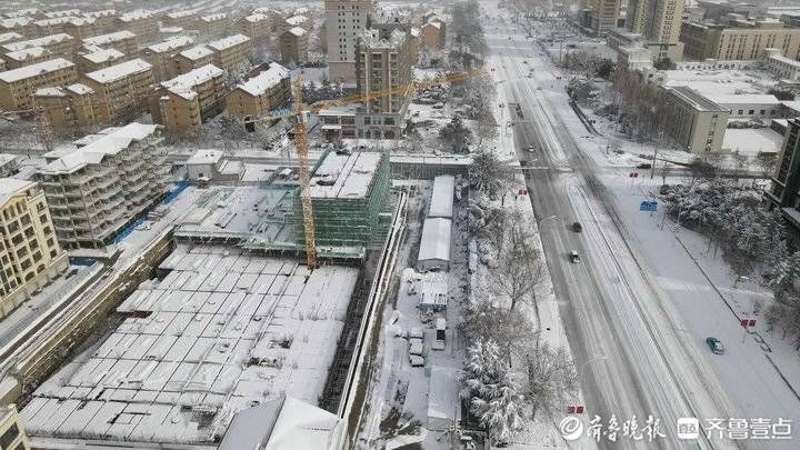 周青先|威海荣成今冬首场暴雪，航拍城市景象美如童话